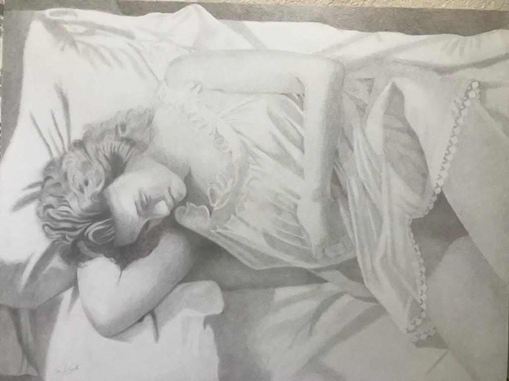 A drawing of a child sleeping in bed